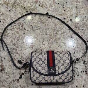 Ophidia flap shoulder bag in blue